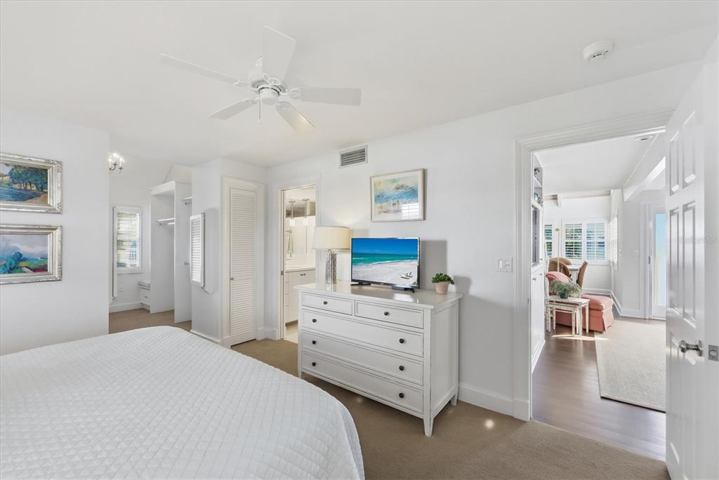 5000 Gasparilla Road, Unit 16 Boca Grande, FL 33921 - Photo 11 of 46 a bedroom with a bed and a television