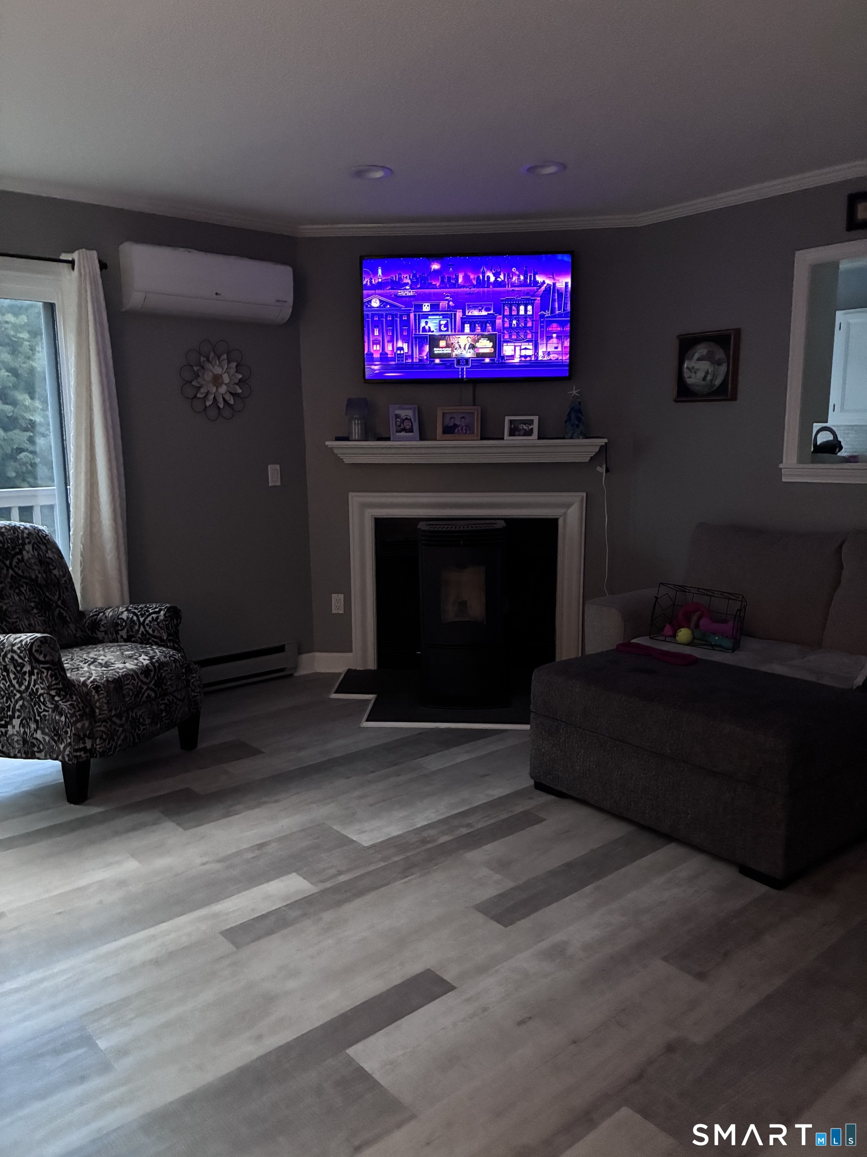 111 Riverton Road, Unit 79 Winsted, CT 06098 - Photo 2 of 5 Living Room with Sliders and Fire Place