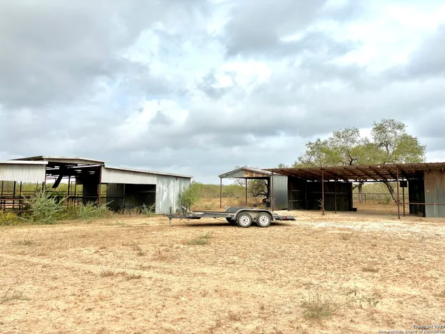 a view of car parked in front of house