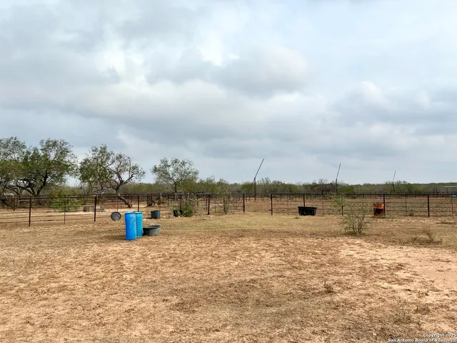 a view of a lake with a yard