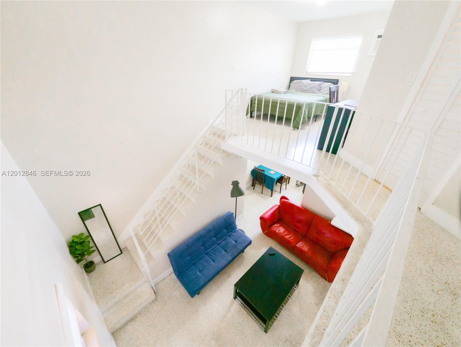 1220 Southwest 5th Street, Unit 16 Miami, FL 33135 - Photo 2 of 8 view of living room with furniture and rug