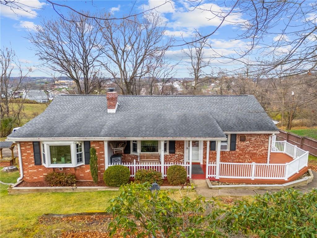 183 Lindley Road Canonsburg, PA 15317 - Photo 1 of 44 a front view of a house with a yard table and chairs