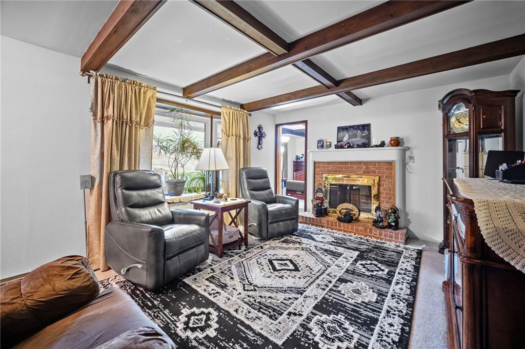 183 Lindley Road Canonsburg, PA 15317 - Photo 14 of 44 a living room with furniture and a fireplace