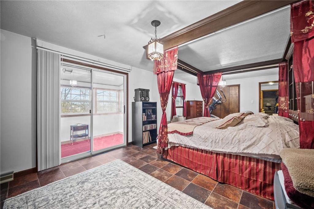 183 Lindley Road Canonsburg, PA 15317 - Photo 22 of 44 a bed sitting in a bedroom next to a window