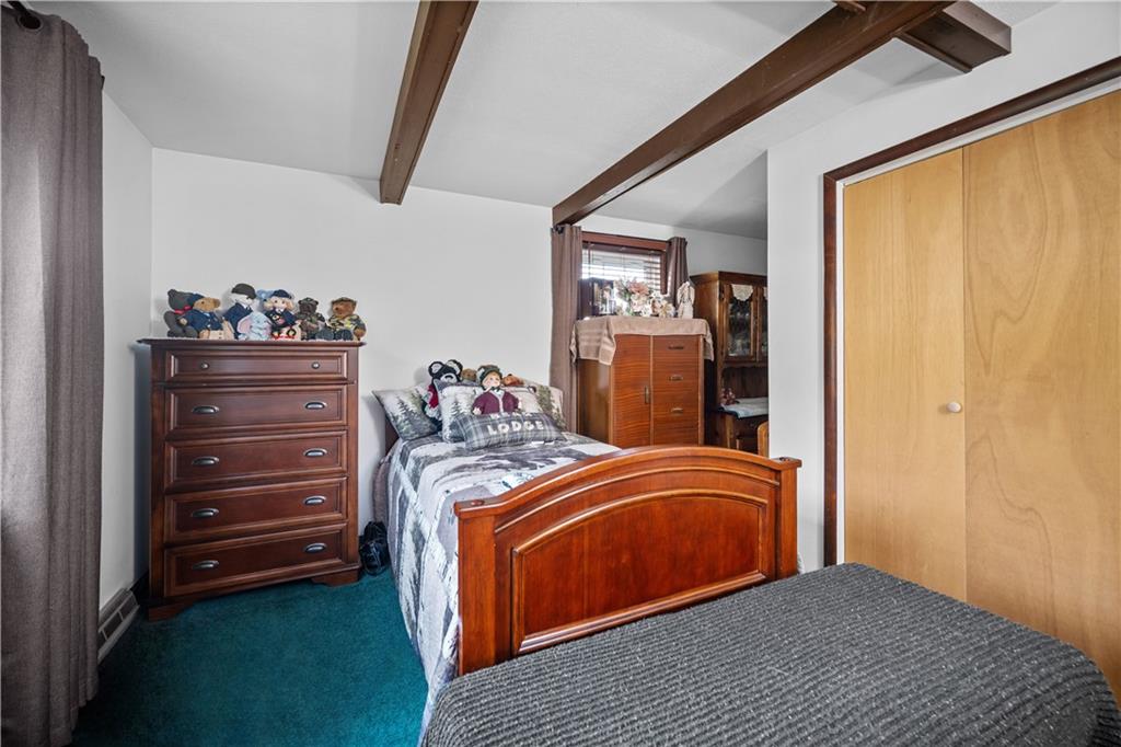 183 Lindley Road Canonsburg, PA 15317 - Photo 27 of 44 a bedroom with a bed and a dresser