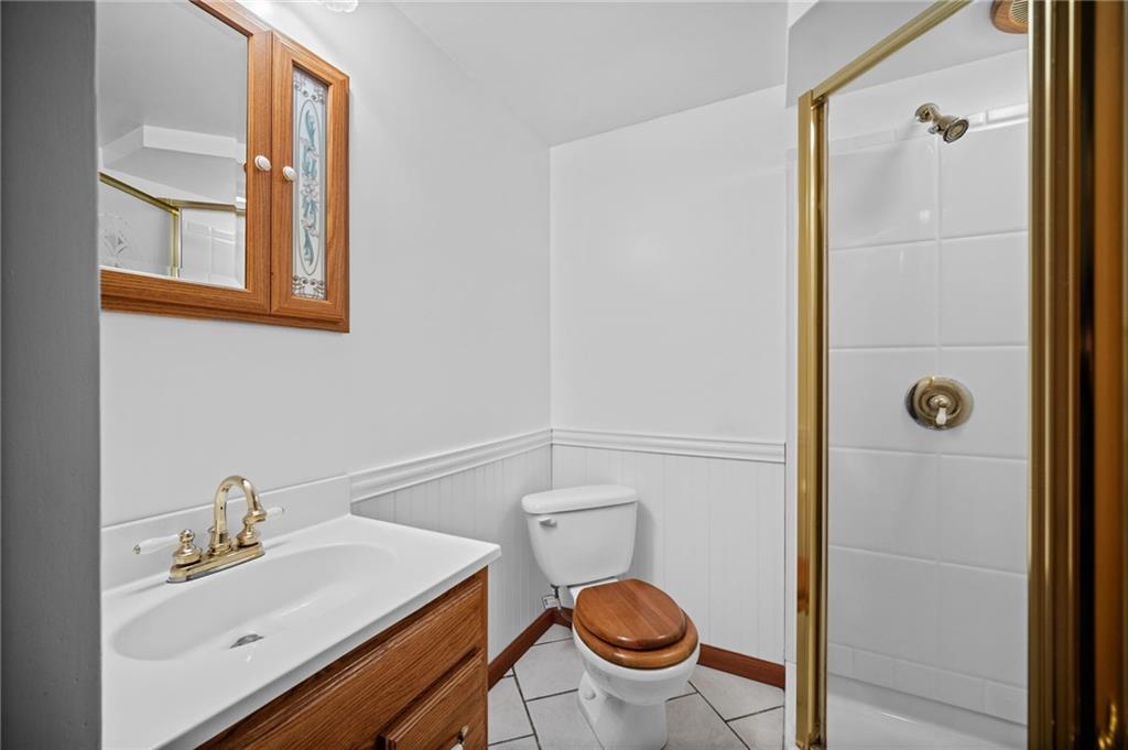 183 Lindley Road Canonsburg, PA 15317 - Photo 35 of 44 a bathroom with a sink and a mirror