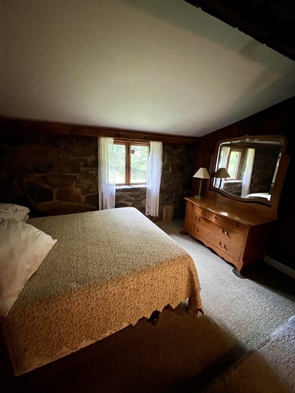 7 Shepard Place Sturbridge, MA 01566 - Photo 18 of 34 a bedroom with a bed and a dresser
