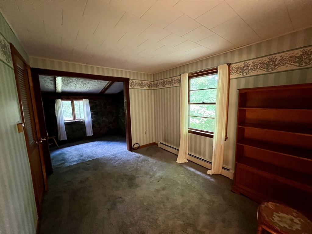 7 Shepard Place Sturbridge, MA 01566 - Photo 20 of 34 a view of empty room with closet and cabinet