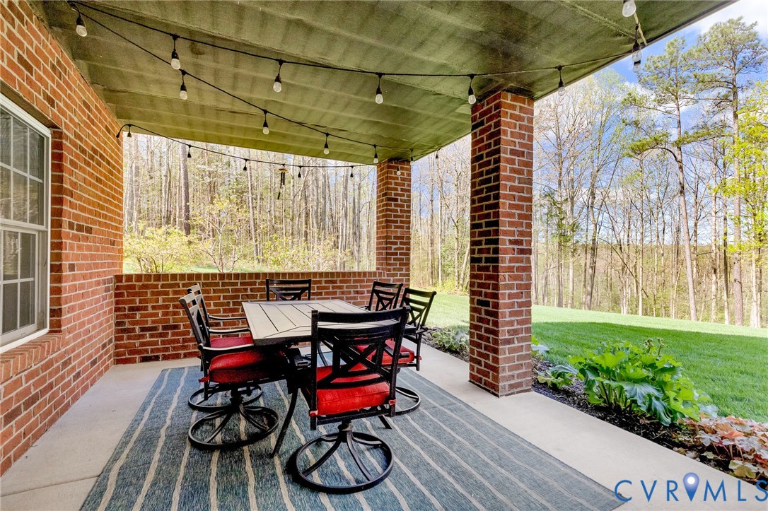 14436 Overlook Ridge Lane Beaverdam, VA 23015 - Photo 63 of 82 a view of a chairs with a table and chairs in patio
