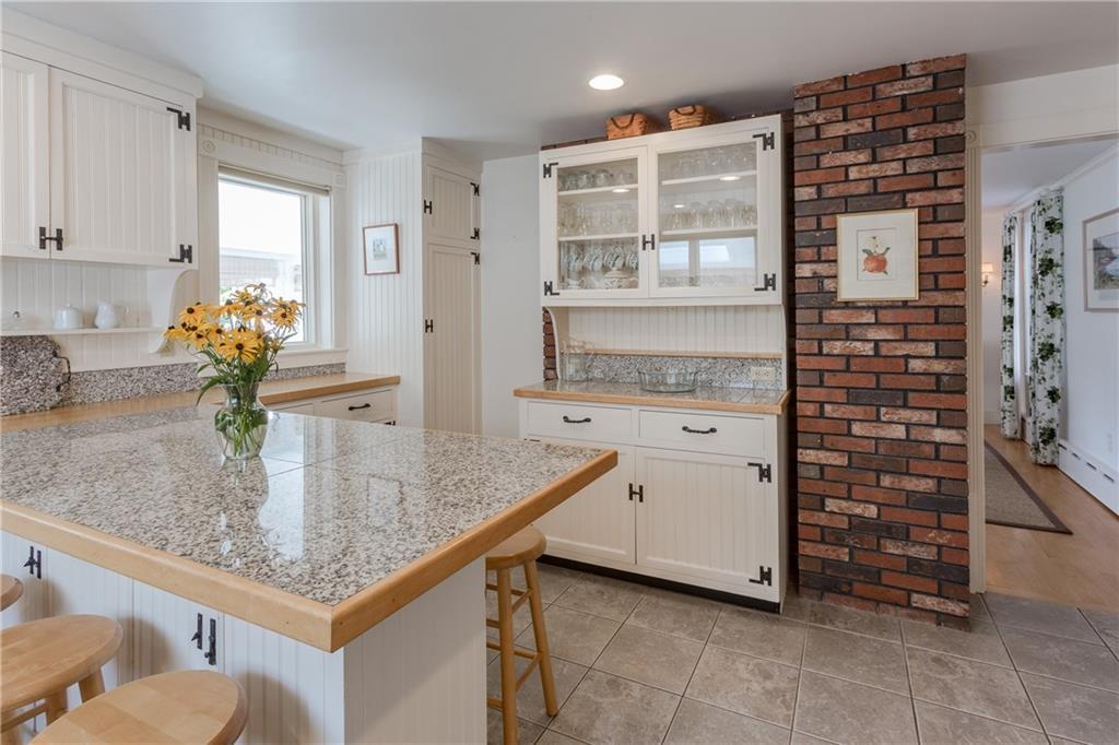 11 Manchester Road Northeast Harbor, ME 04662 - Photo 15 of 33 A country kitchen with granite...