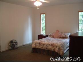 133 Grandview Lane Rutherfordton, NC 28139 - Photo 7 of 9 a bedroom with a bed and window
