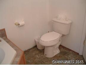 133 Grandview Lane Rutherfordton, NC 28139 - Photo 9 of 9 a white toilet sitting next to a white sink