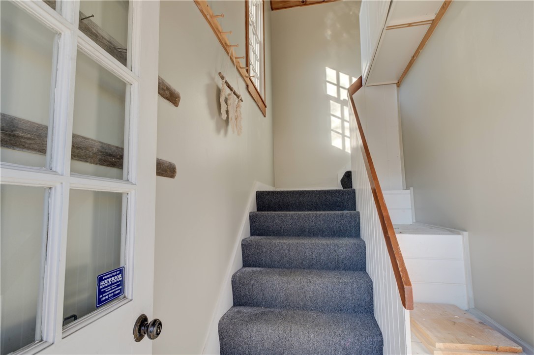 3351 Post Road Warwick, RI 02886 - Photo 4 of 20 Private entrance to 2nd floor apartment with lots of storage space for shoes, hats and coats.