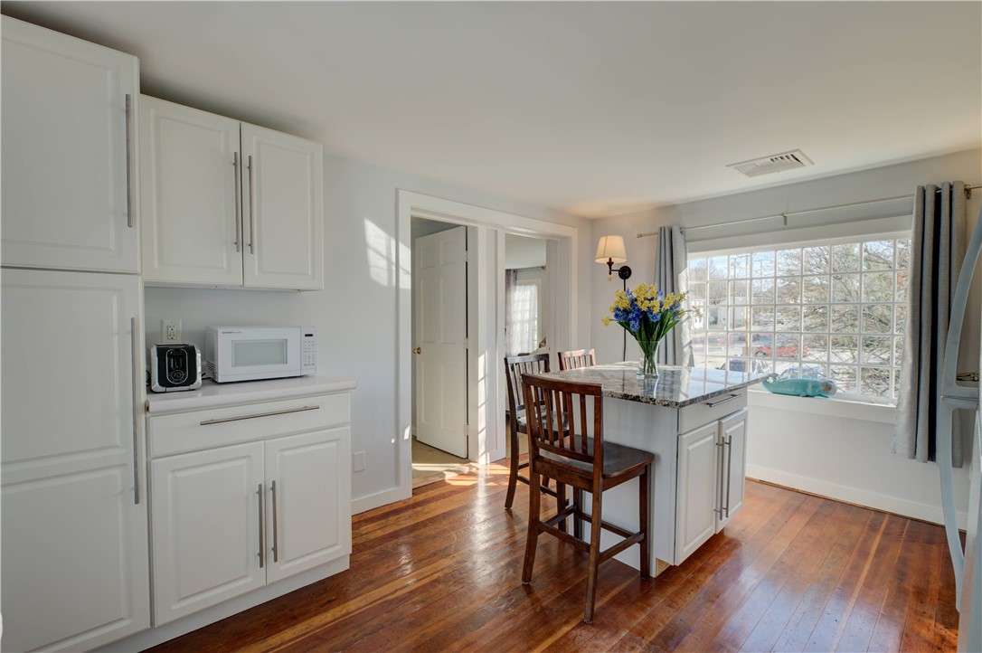 3351 Post Road Warwick, RI 02886 - Photo 6 of 20 Bright cheery eat in kitchen with loads of natural sunlight