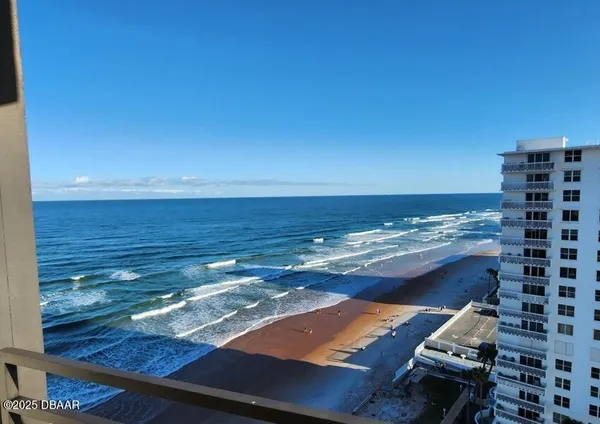 a view of a balcony with city view