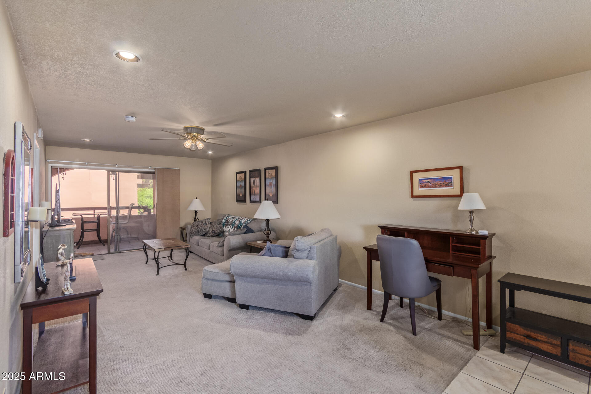 4303 East Cactus Road, Unit 202 Phoenix, AZ 85032 - Photo 5 of 34 a living room with furniture and a potted plant