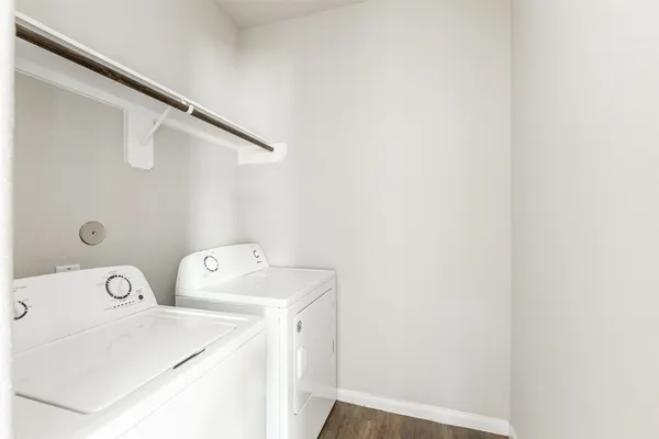 a utility room with dryer and washer