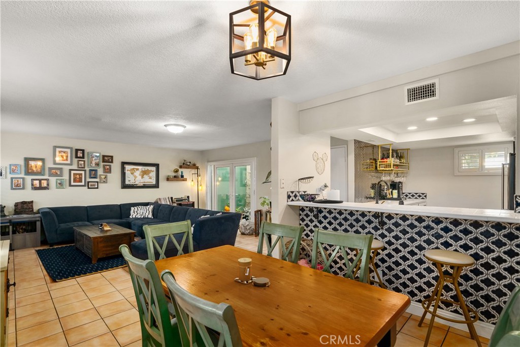 2752 Craig Circle Fullerton, CA 92835 - Photo 12 of 38 a living room with furniture a table and chairs