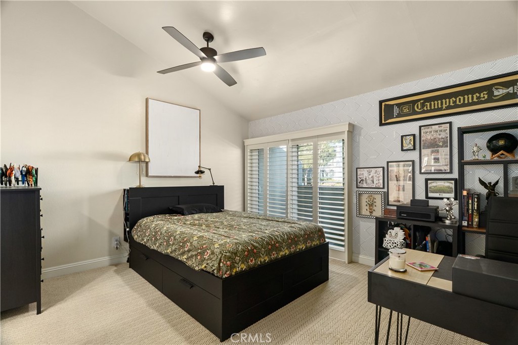 2752 Craig Circle Fullerton, CA 92835 - Photo 14 of 38 a bedroom with a bed and a chandelier