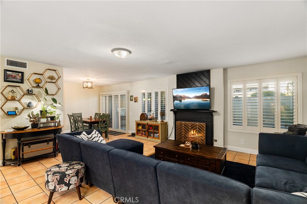 2752 Craig Circle Fullerton, CA 92835 - Photo 5 of 38 a living room with furniture and a flat screen tv
