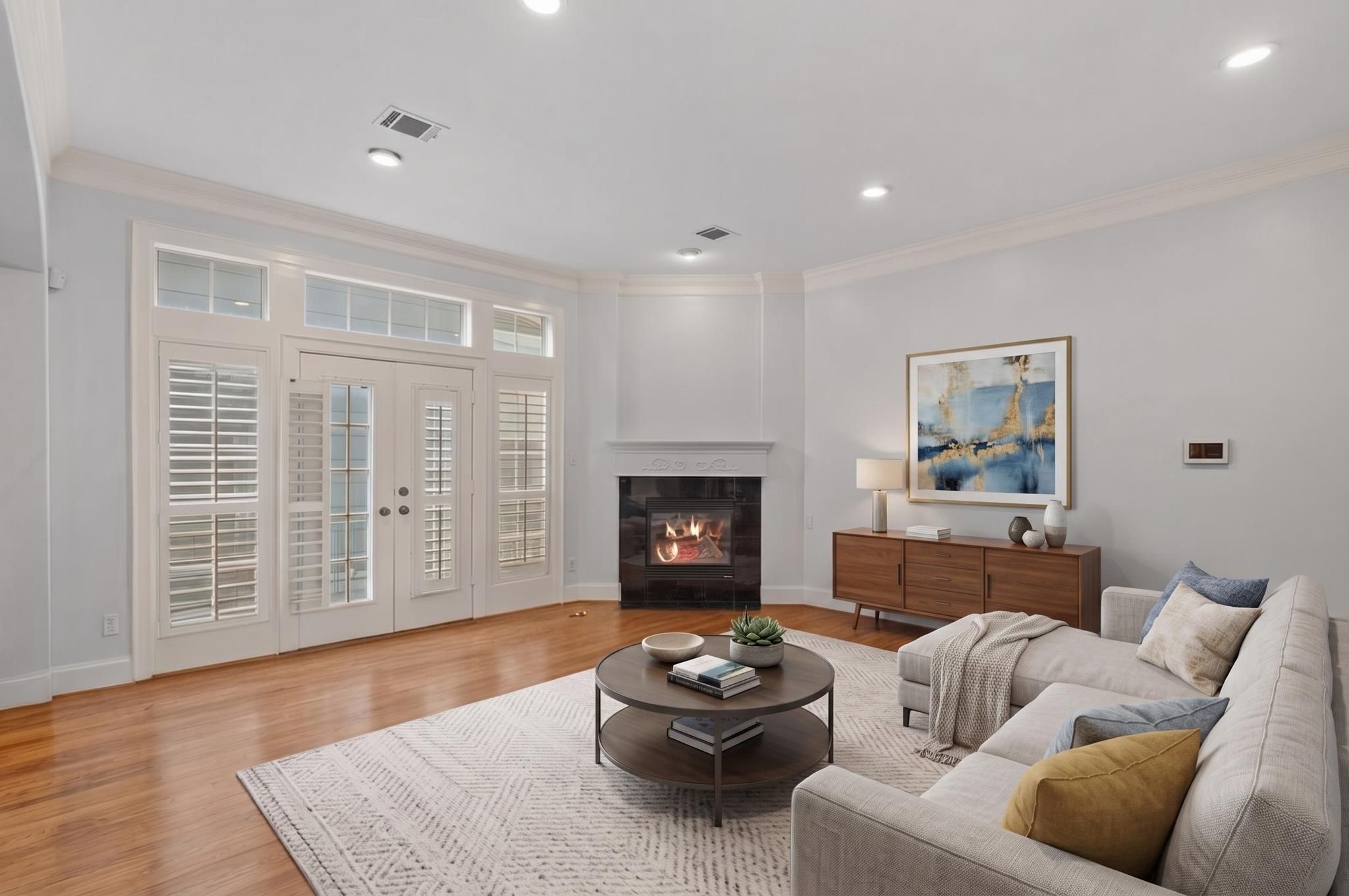 1007 Crocker Street Houston, TX 77019 - Photo 11 of 13 a living room with furniture and a fireplace
