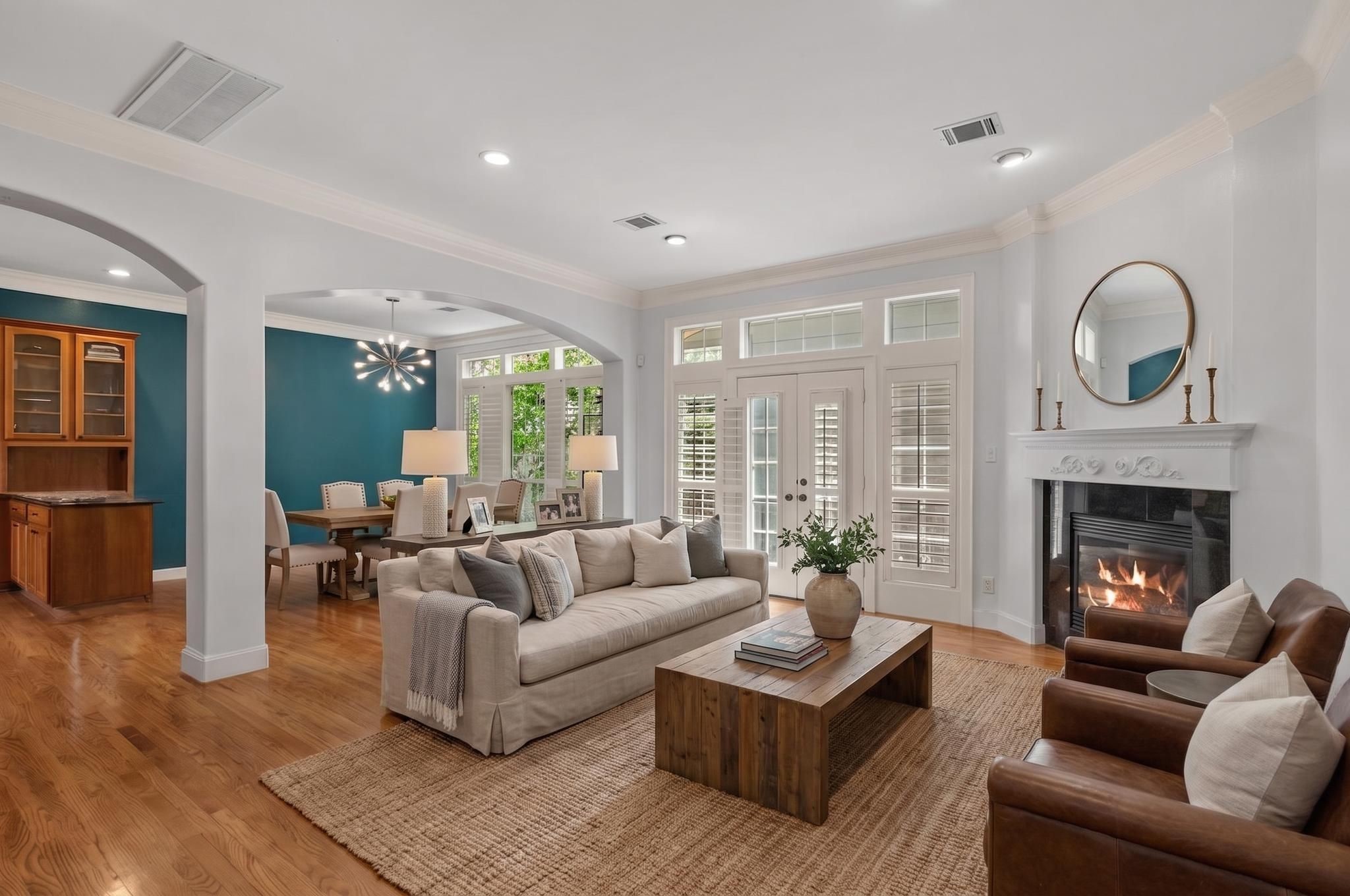 1007 Crocker Street Houston, TX 77019 - Photo 2 of 13 a living room with furniture and a fireplace
