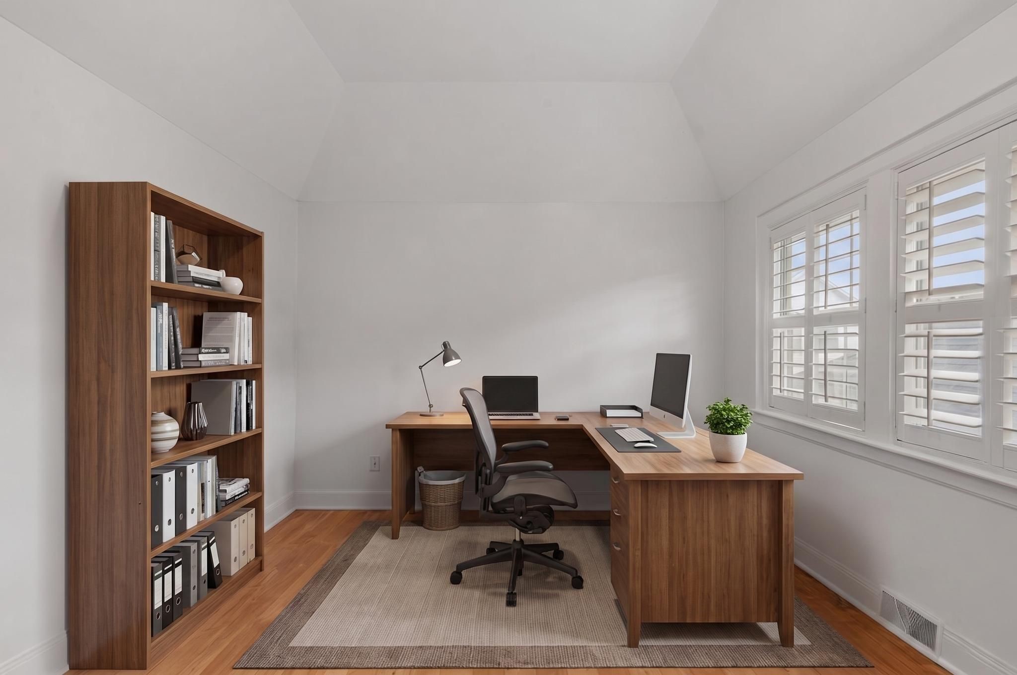 1007 Crocker Street Houston, TX 77019 - Photo 8 of 13 a view of a workspace with furniture and a window