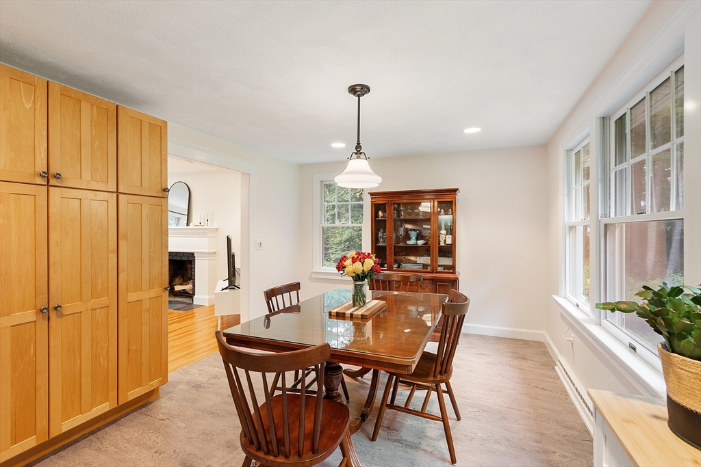 4 Long Meadow Road Chelmsford, MA 01824 - Photo 11 of 30 a dining room with furniture window and wooden floor