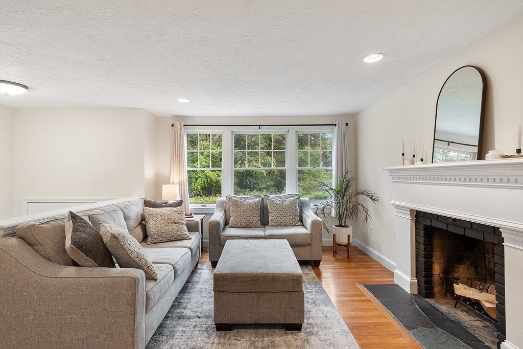 4 Long Meadow Road Chelmsford, MA 01824 - Photo 14 of 30 a living room with furniture and a fireplace