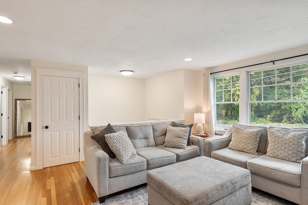 4 Long Meadow Road Chelmsford, MA 01824 - Photo 15 of 30 a living room with furniture and a large window