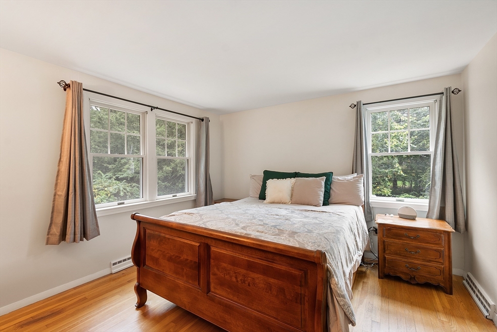 4 Long Meadow Road Chelmsford, MA 01824 - Photo 16 of 30 a bedroom with a bed and a large window