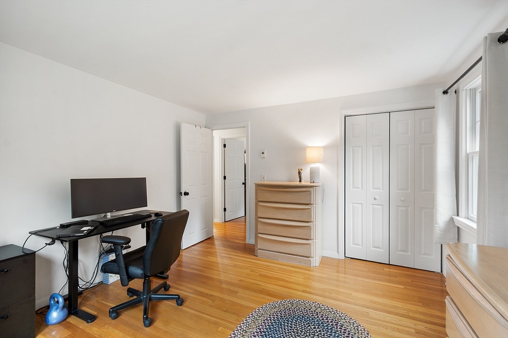 4 Long Meadow Road Chelmsford, MA 01824 - Photo 18 of 30 a view of a workspace with furniture and wooden floor