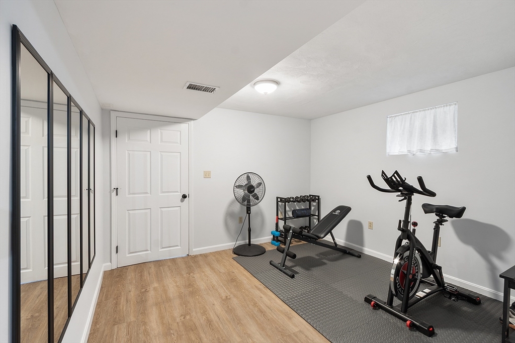 4 Long Meadow Road Chelmsford, MA 01824 - Photo 24 of 30 a view of a room with gym equipment