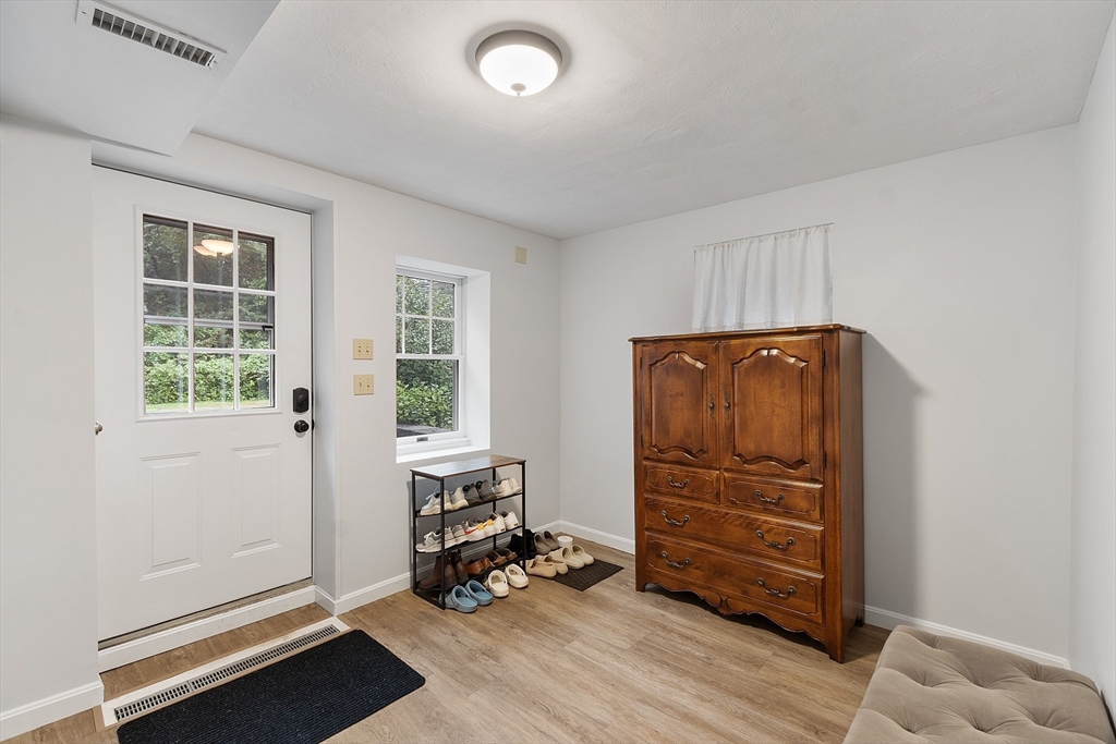 4 Long Meadow Road Chelmsford, MA 01824 - Photo 25 of 30 a room with chair and a window