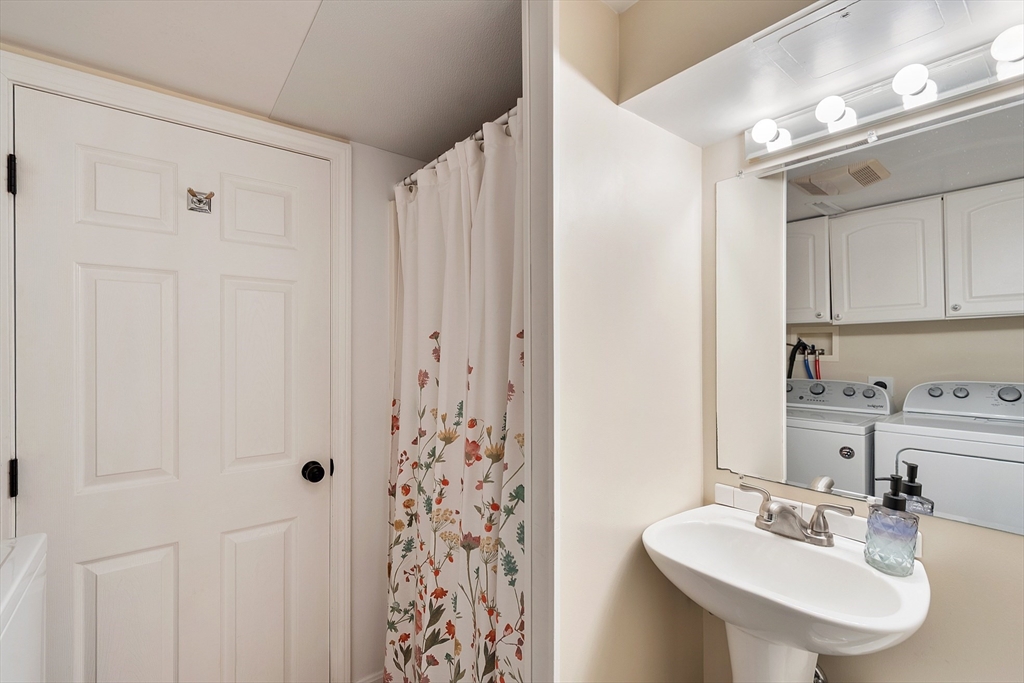 4 Long Meadow Road Chelmsford, MA 01824 - Photo 30 of 30 a bathroom with a sink and a mirror