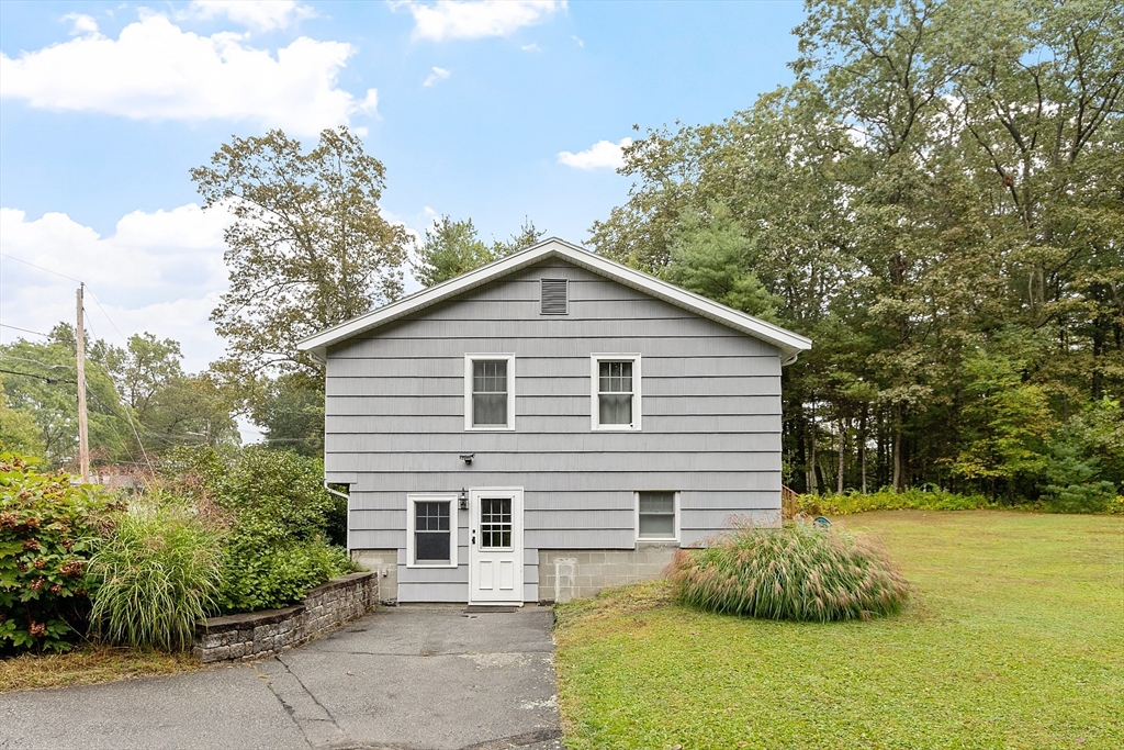 4 Long Meadow Road Chelmsford, MA 01824 - Photo 3 of 30 a view of a house with a yard