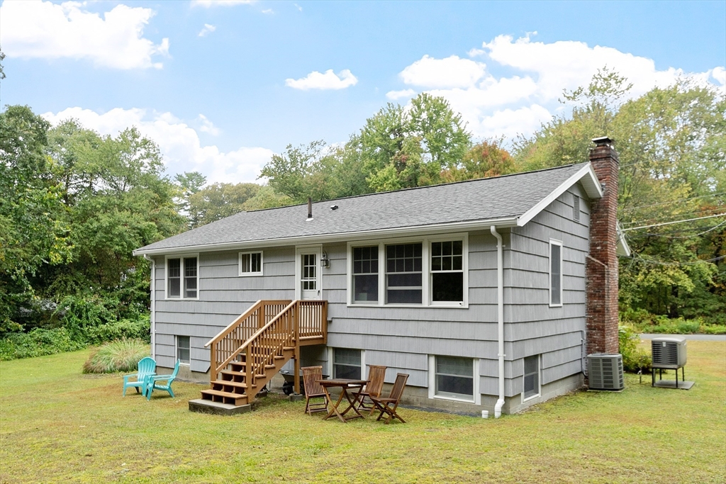 4 Long Meadow Road Chelmsford, MA 01824 - Photo 4 of 30 a view of a house with a yard