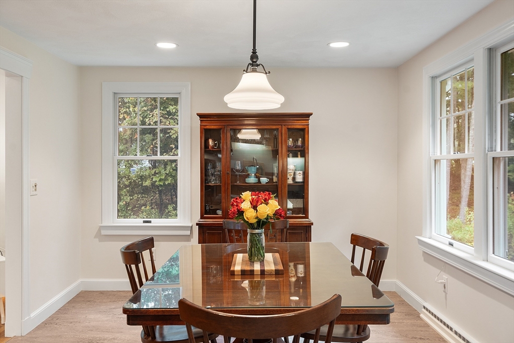 4 Long Meadow Road Chelmsford, MA 01824 - Photo 9 of 30 a dining room with furniture window and wooden floor