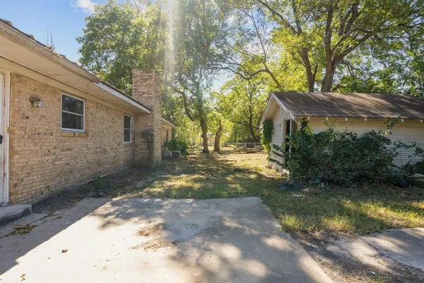 a view of backyard with green space