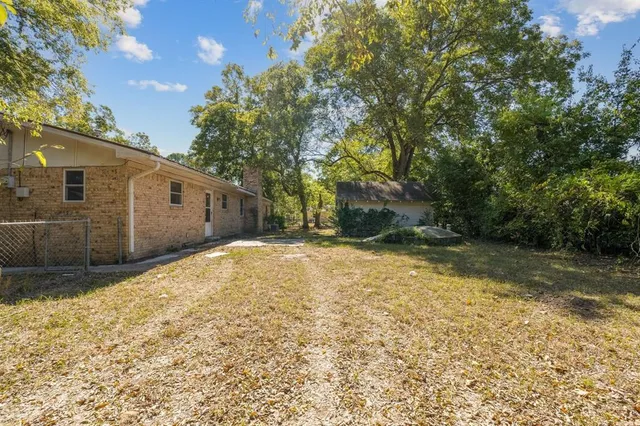 a view of backyard of house