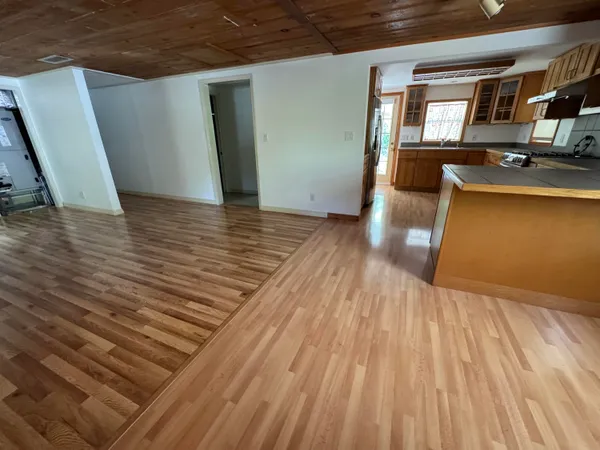a view of a kitchen from a house