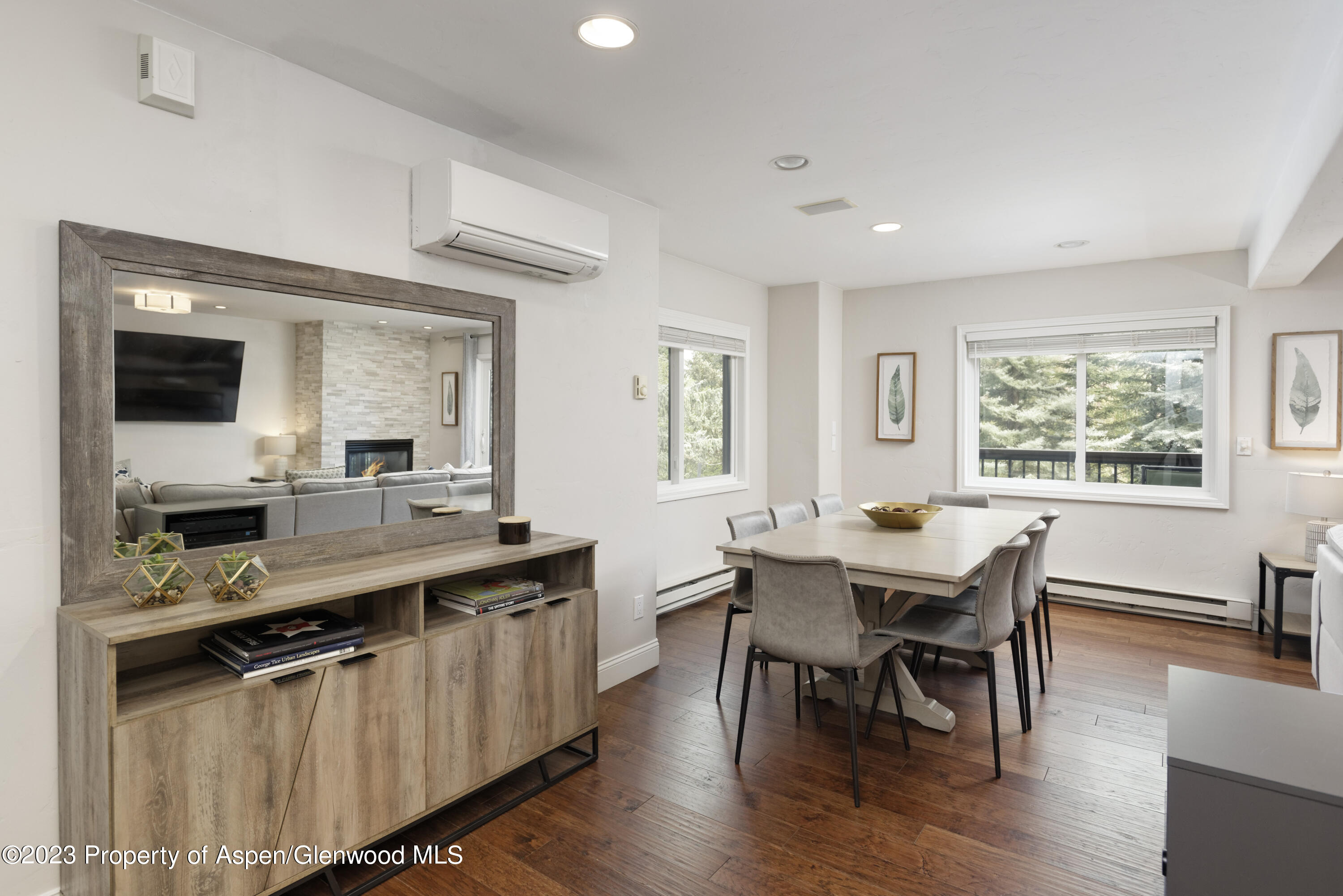 650 South Monarch Street, Unit 2 Aspen, CO 81611 - Photo 4 of 21 a view of a dining room with furniture and wooden floor