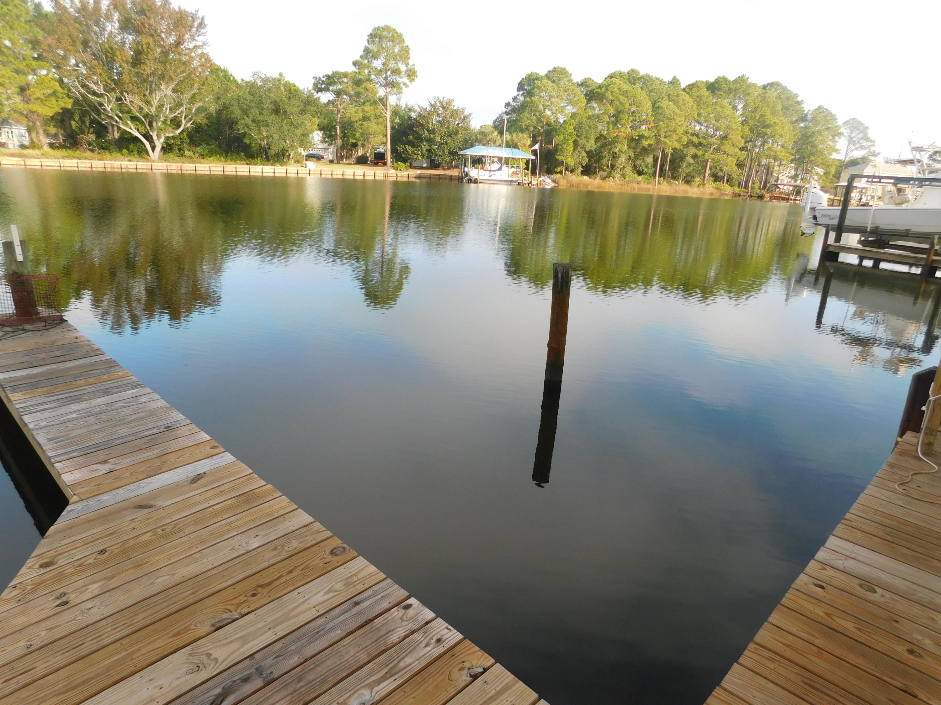 144 My Way, Unit A Santa Rosa Beach, FL 32459 - Photo 25 of 25 a view of a lake with houses