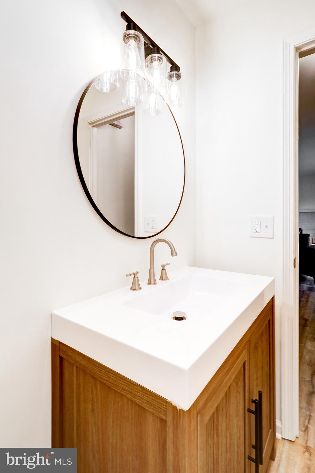 2818 Nolt Road Lancaster, PA 17601 - Photo 17 of 37 a bathroom with a sink and a mirror