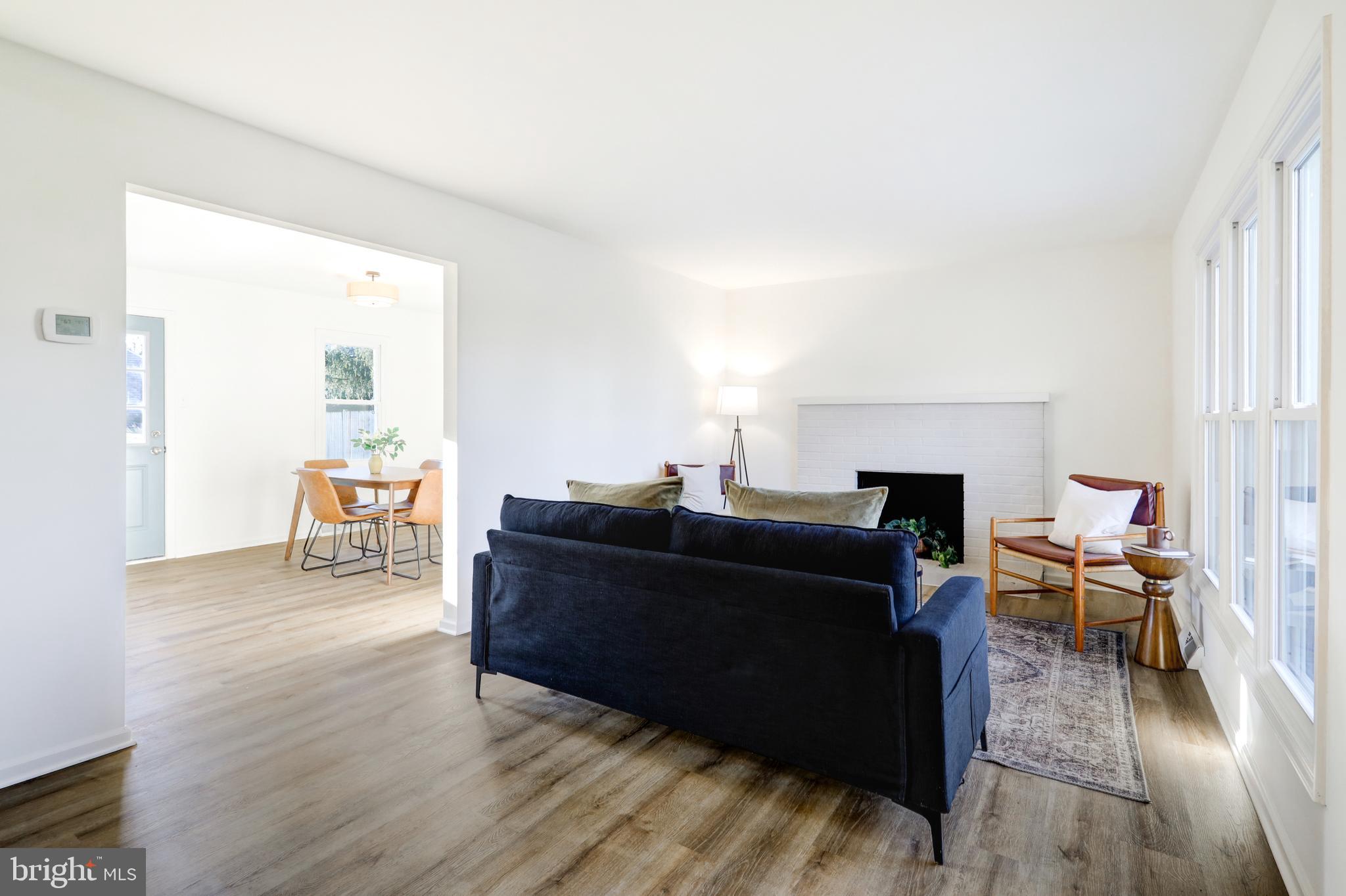 2818 Nolt Road Lancaster, PA 17601 - Photo 2 of 37 a living room with furniture and a fireplace
