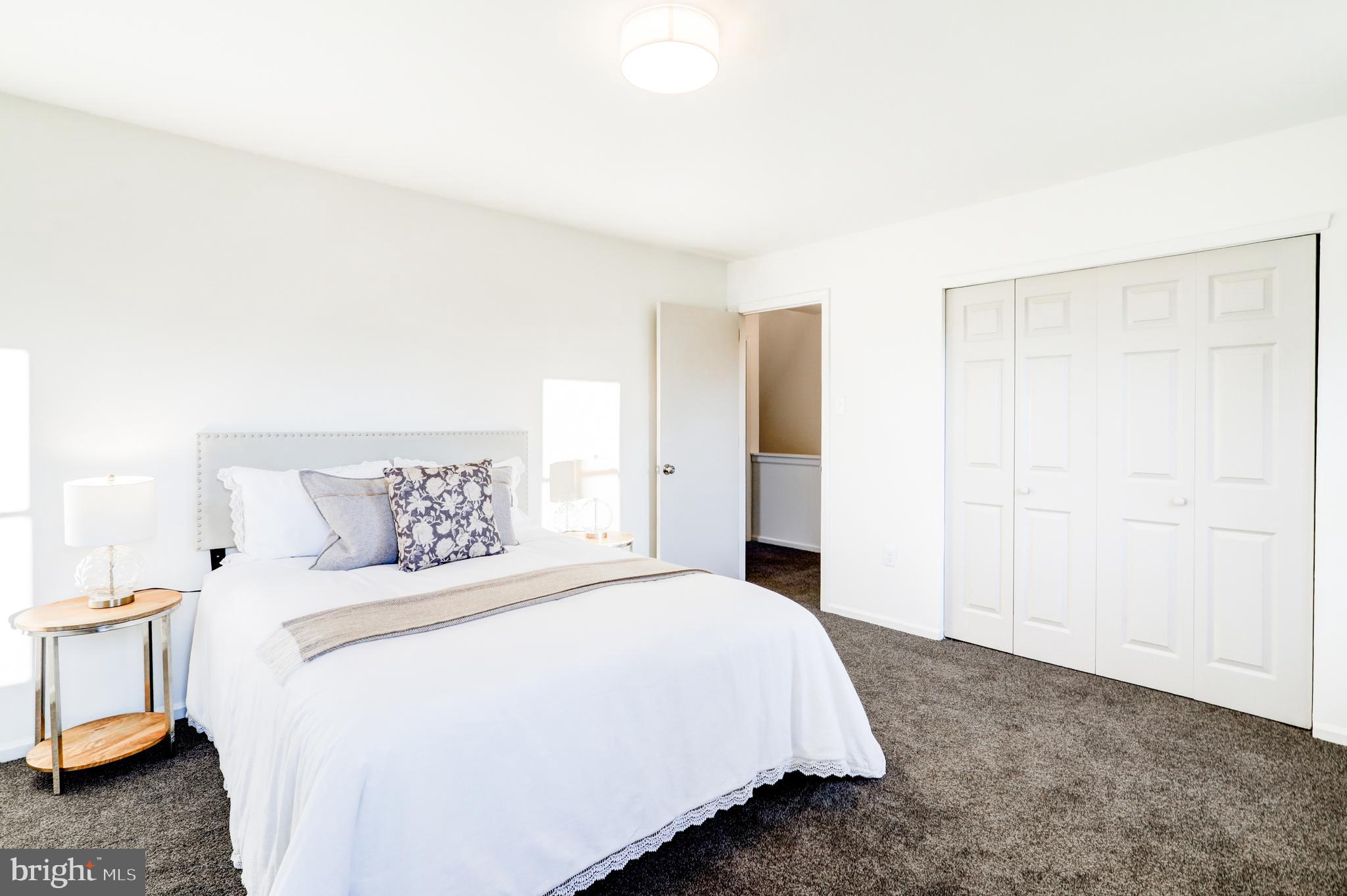 2818 Nolt Road Lancaster, PA 17601 - Photo 24 of 37 a bedroom with a bed and a couch