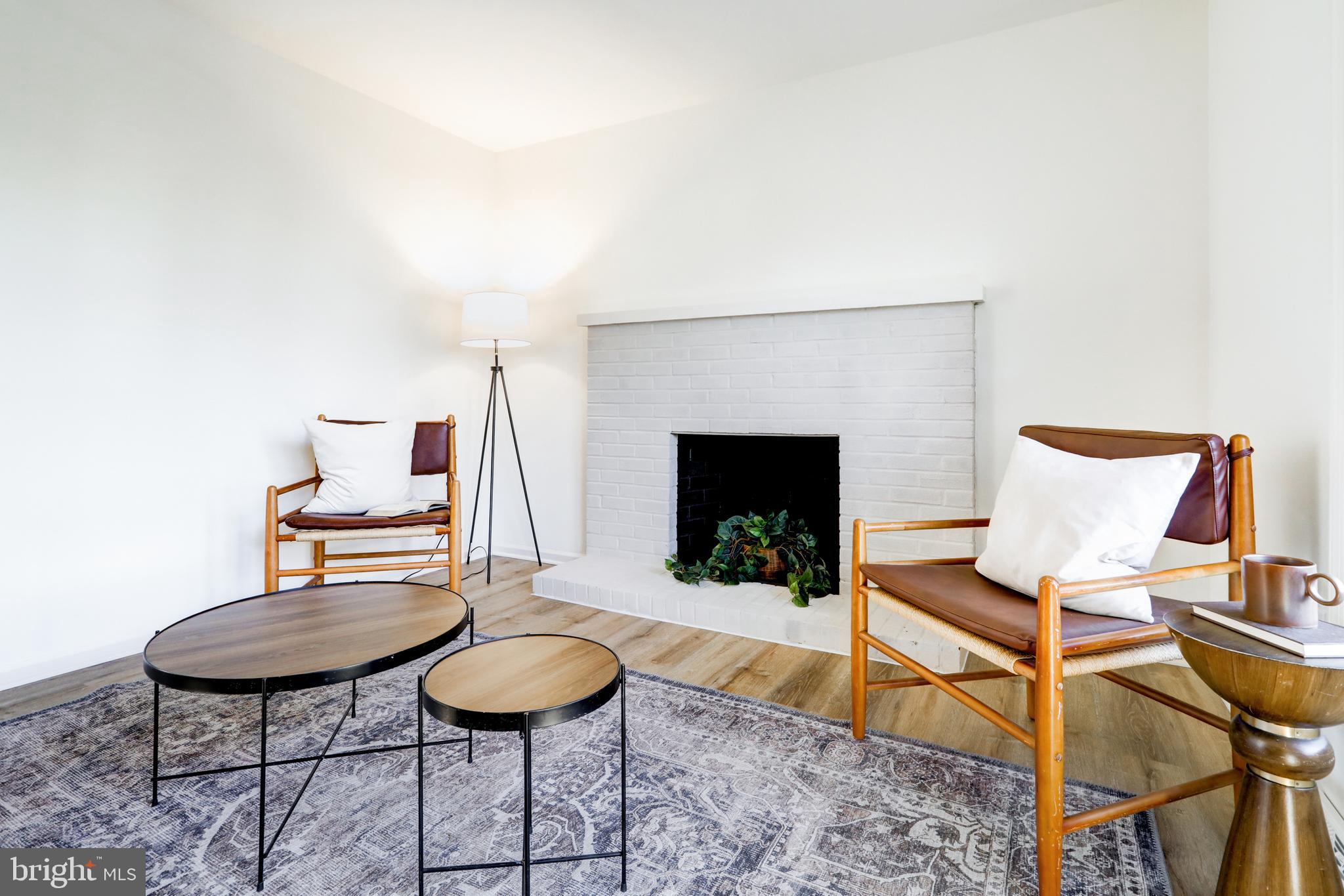 2818 Nolt Road Lancaster, PA 17601 - Photo 5 of 37 a living room with furniture and a fireplace