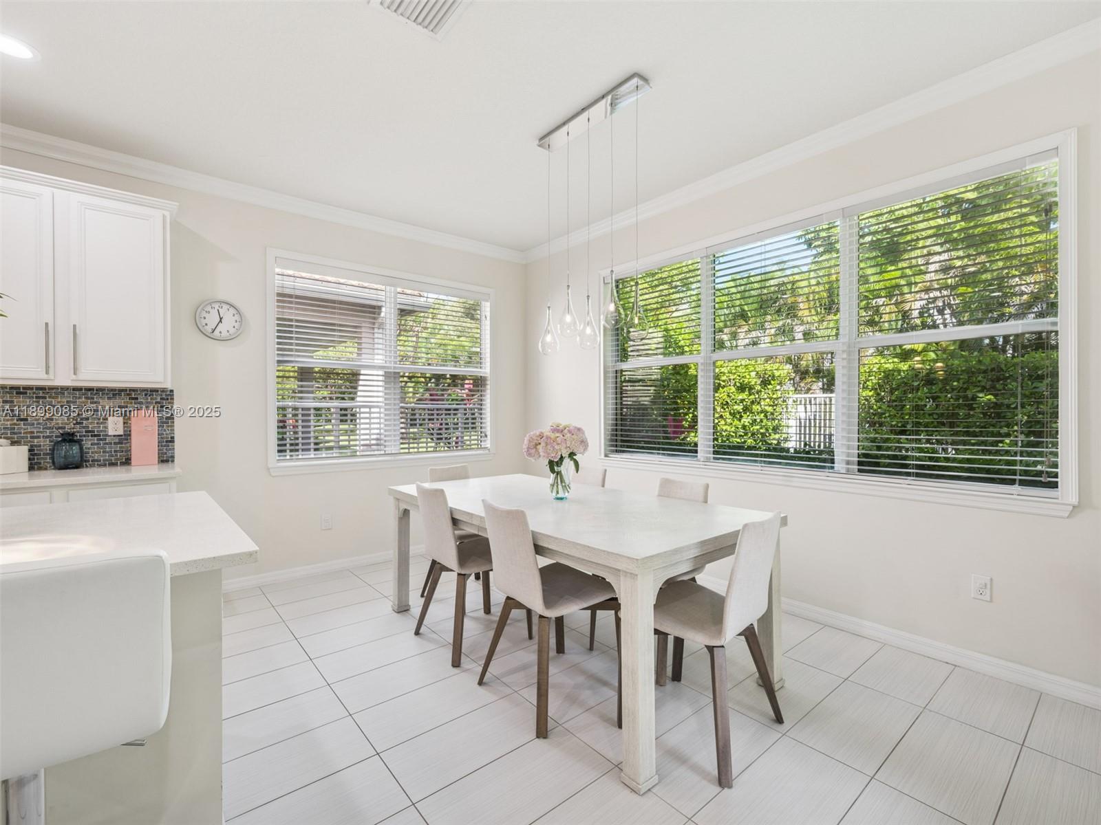 4325 Large Leaf Lane Hollywood, FL 33021 - Photo 18 of 72 a view of a dining room with furniture window and outside view