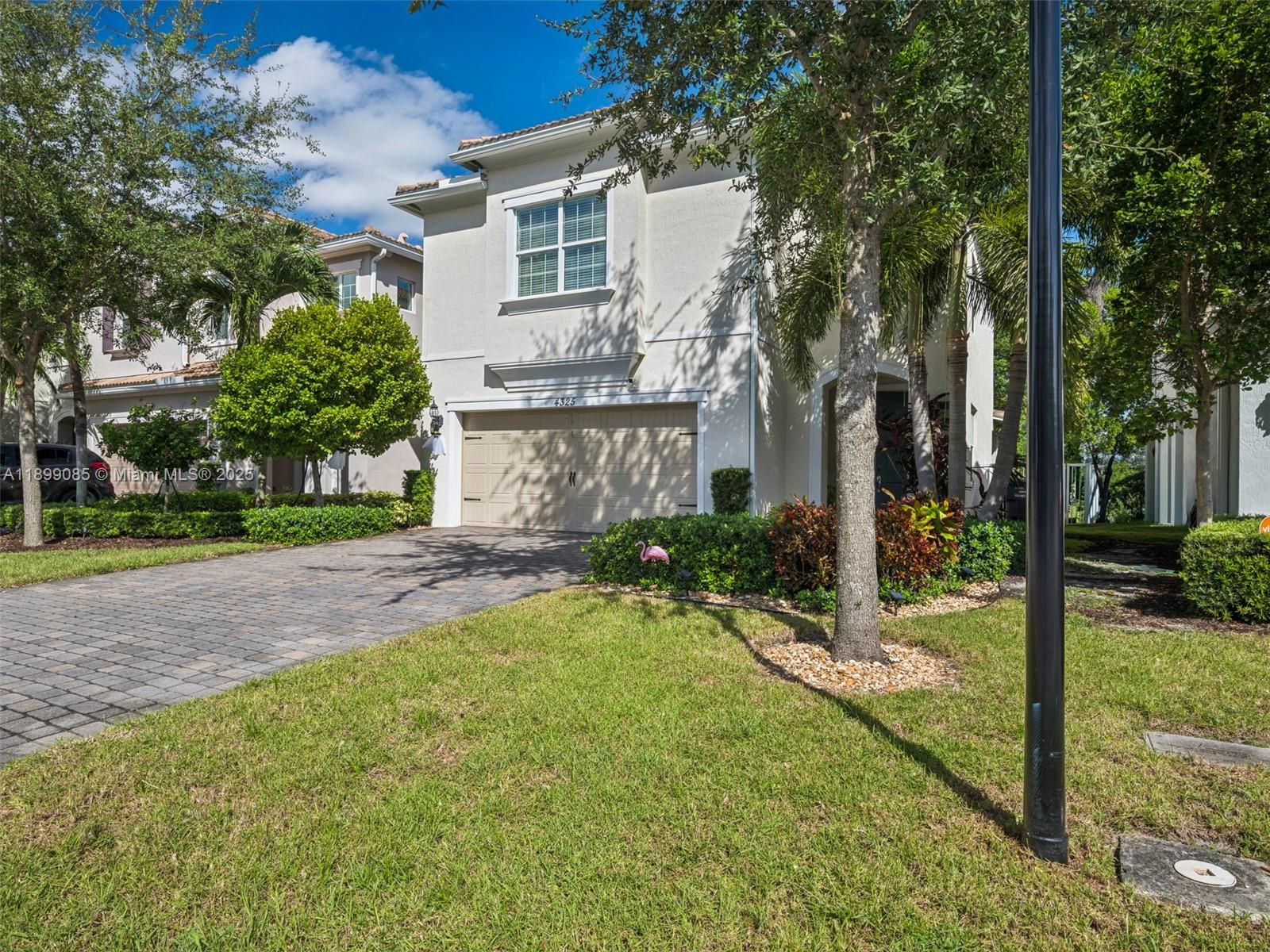 4325 Large Leaf Lane Hollywood, FL 33021 - Photo 2 of 72 a view of a house with a yard and tree s