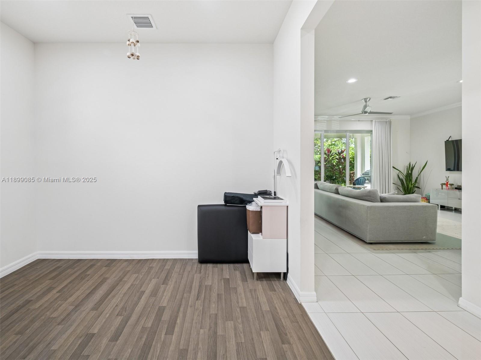 4325 Large Leaf Lane Hollywood, FL 33021 - Photo 22 of 72 a living room with furniture and a wooden floor